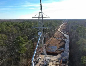 Photo of a transmission line being rebuilt