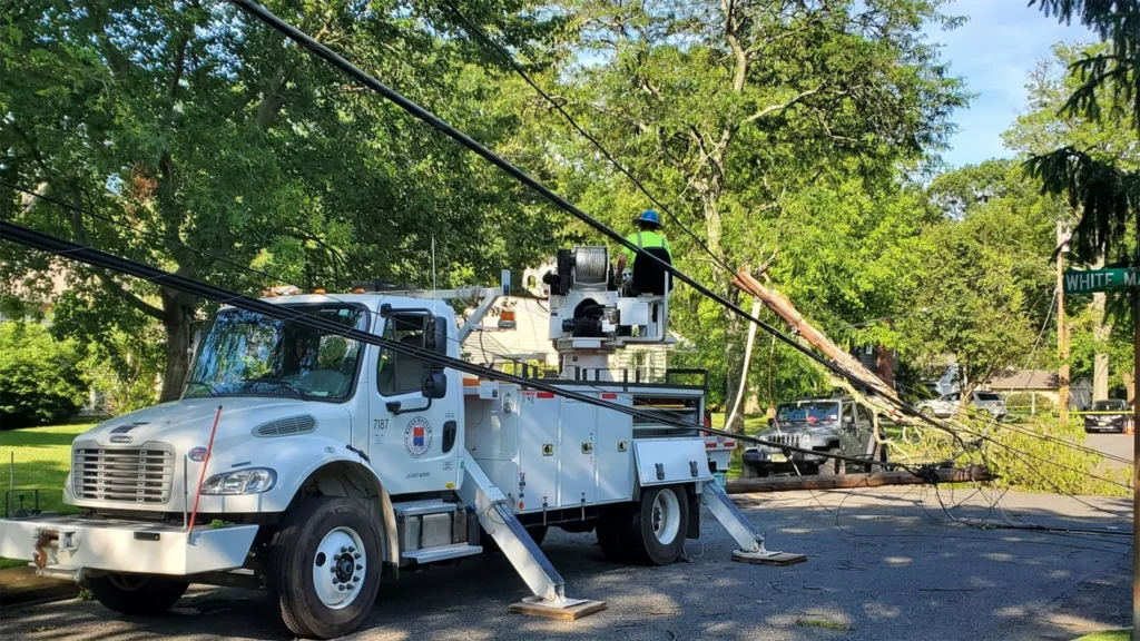 Riggs Distler truck and employees working on restoring power after a storm