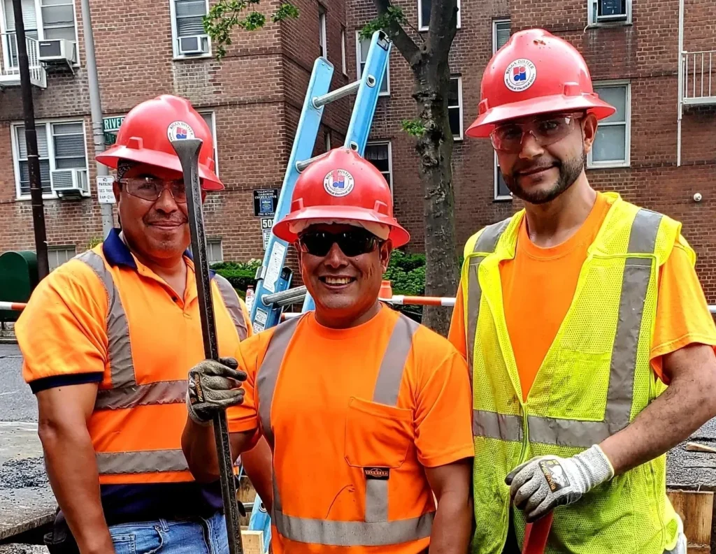 Three Crew Members working Underground Gas Utility